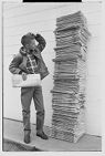 Carrier boy with newspapers